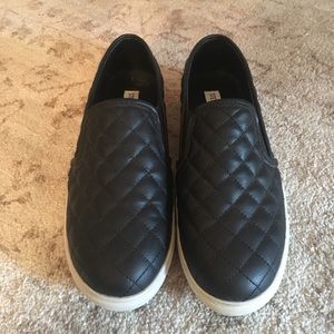 Steve Madden size 9 slip-on shoes.